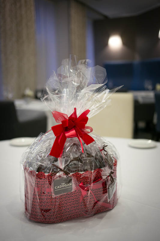 Anniversary Gifts - Crocheted basket filled with 50 pcs of 7 g promotional chocolate bars, 550g