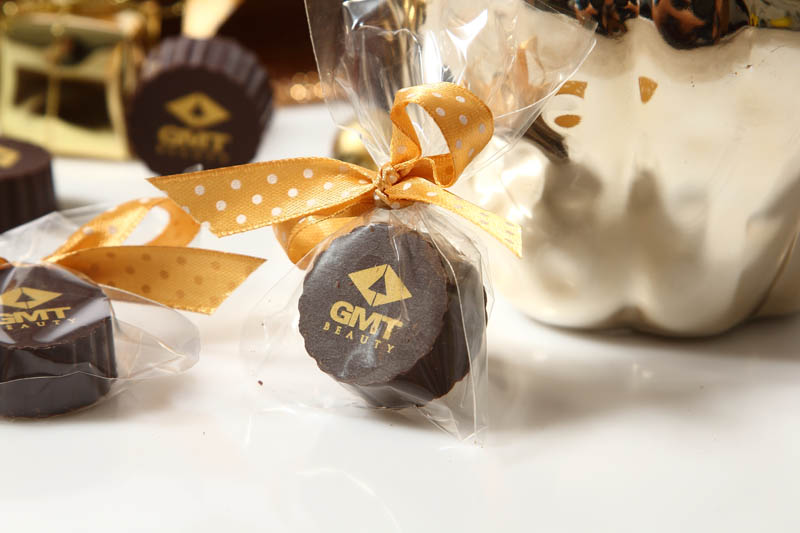 Branded Promo Gifts - 13g Praline with Hazel Nut Cream Filling in a polybag with Ribbon